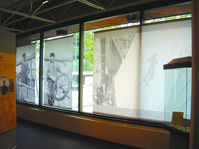 Photo panels in museum windows