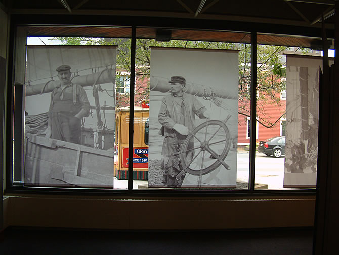 Photo panels in museum windows